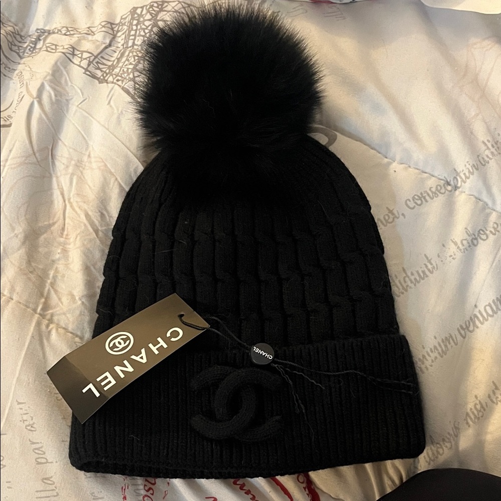 CHANEL Black Knit Hat with Pom Pom